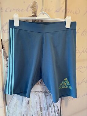New w/o tags. Adidas Women’s Teal Athletic Shorts with Light Aqua Stripes
